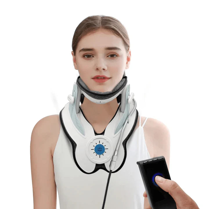 woman wearing Cervitrax Gen-2 neck therapy device with remote control in hand