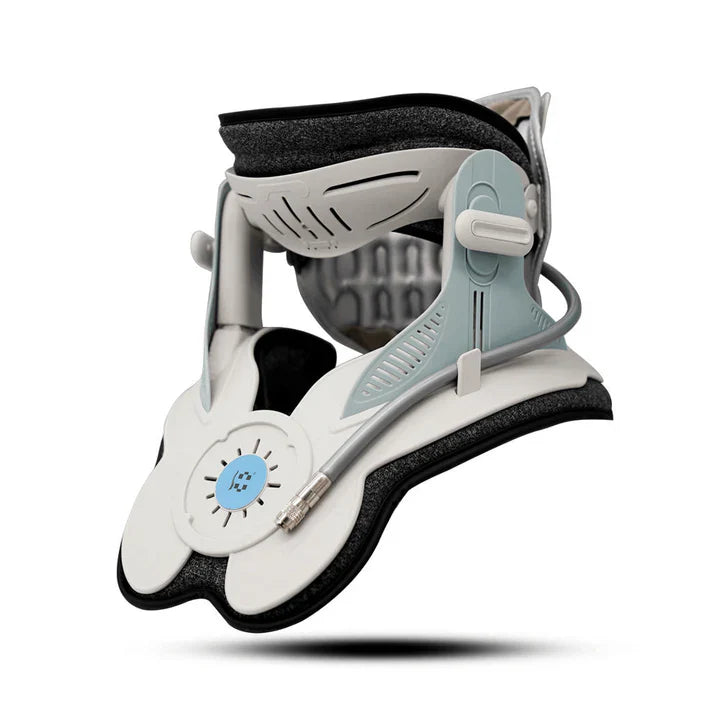 Cervitrax Gen-2 cervical traction neck device in white and gray with adjustable support and tubing
