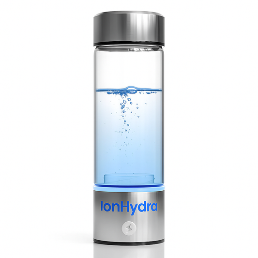 IonHydra™ sleek hydrogen water bottle with clear body and silver cap generating hydrogen bubbles.