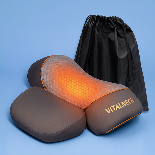 VitalNeck Thera Pillow with heating feature and adjustable cushions next to black carrying bag on blue background