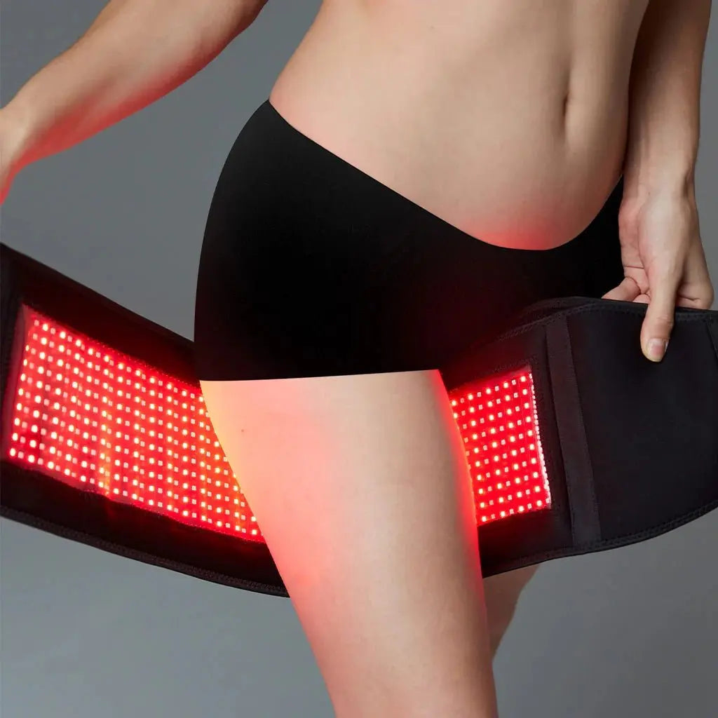 BodiBeam Belt with red LED light therapy in use.