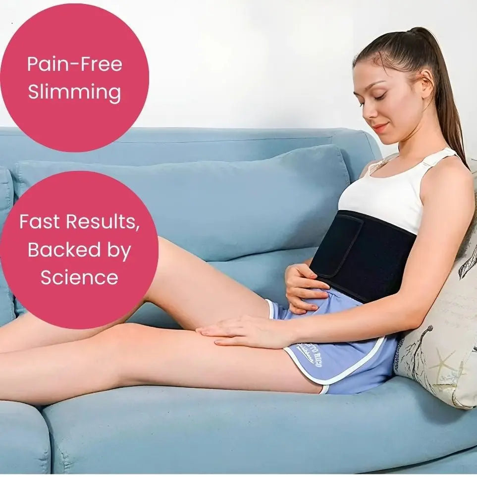 Woman using BodiBeam Belt on couch for pain-free slimming and fast results.