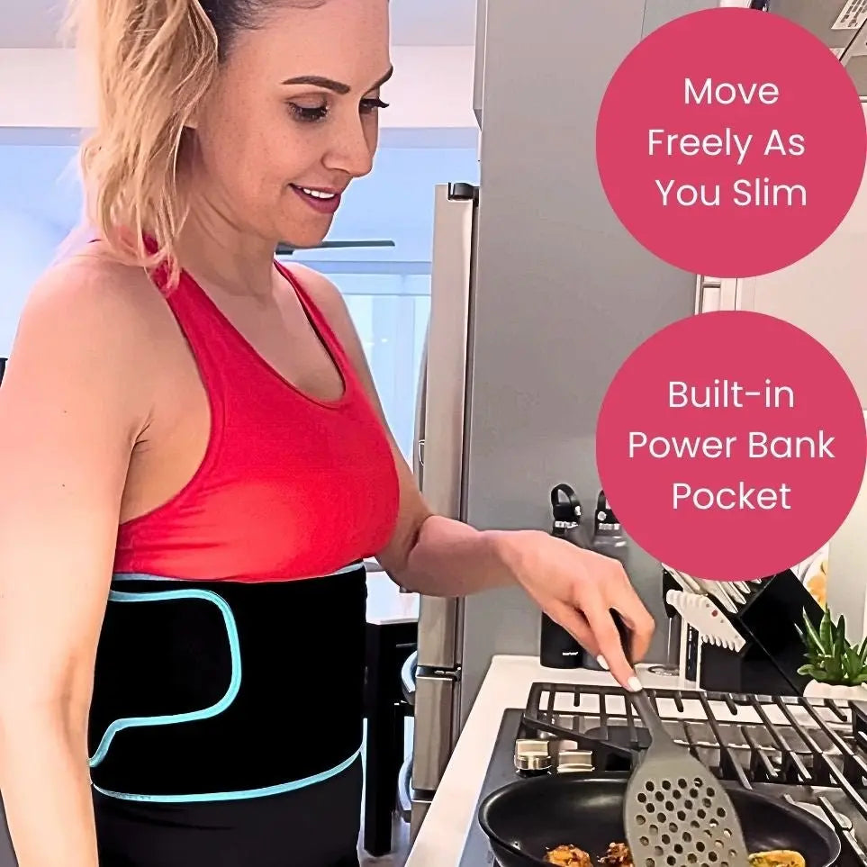 Woman wearing BodiBeam Belt while cooking in kitchen.